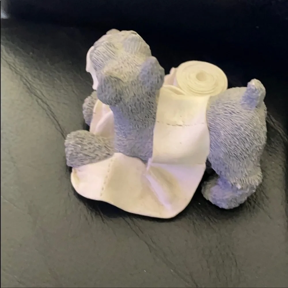 Doggy statue with toilet paper